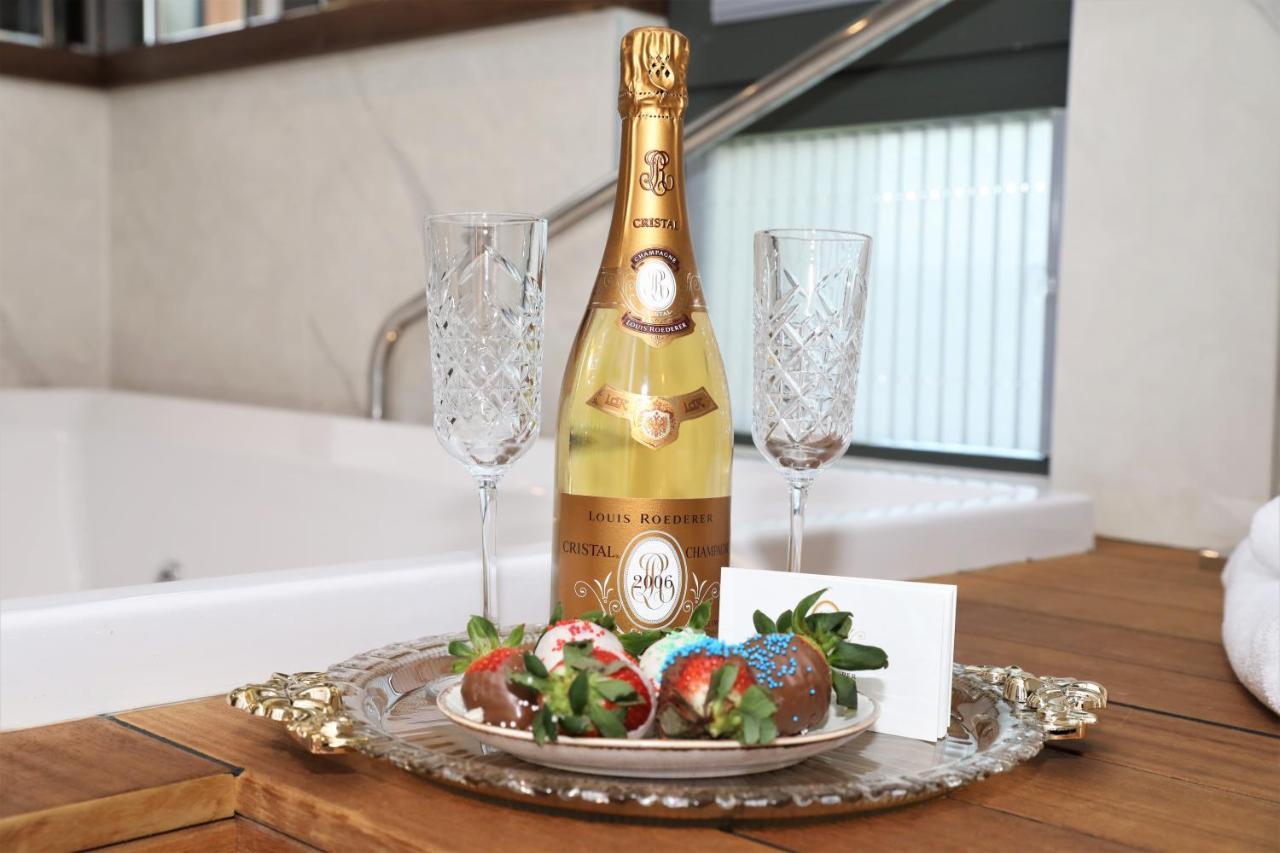 Limak Skopje Luxury Hotel Exterior photo A bottle of Dom Pérignon